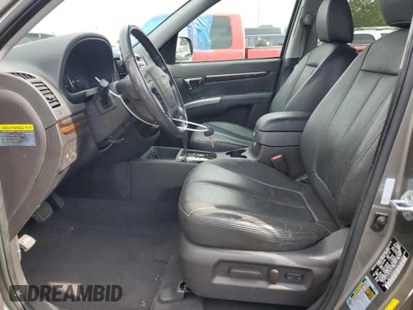 ✅ 2012 Hyundai Santa Fe Limited • VIN: 5XYZKDAG1CG113135 • Lot: 75273574. Listed on Copart with 66,860 mi. Free auction sales archive from the USA and detailed vehicle history report at DreamBid. Image 7.