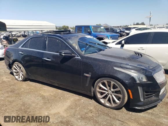 ✅ 2019 Cadillac CTS-V • VIN: 1G6A15S63K0138458 • Lot: 63482374. Listed on Copart with 46,782 mi. Free auction sales archive from the USA and detailed vehicle history report at DreamBid. Image 4.