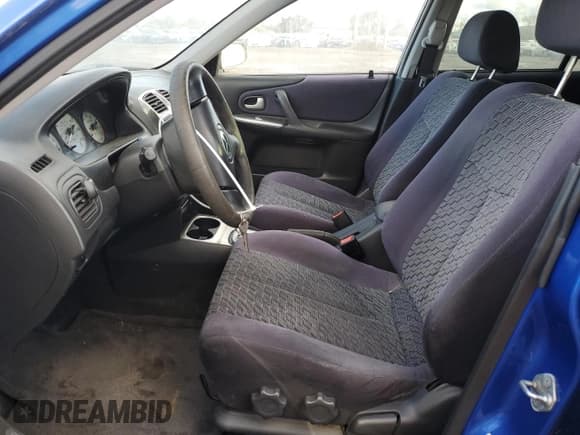 ✅ 2003 Mazda Protege • VIN: JM1BJ245431193789 • Lot: 78711424. Wystawiony na Copart z przebiegiem 135 067 mil. Bezpłatny archiwum sprzedaży aukcyjnych z USA i szczegółowy raport historii pojazdu na DreamBid. Zdjęcie 7.