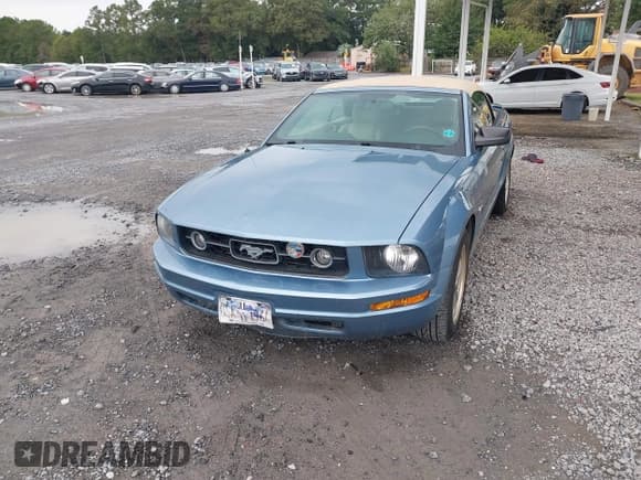 ✅ 2007 Ford Mustang Deluxe • VIN: 1ZVFT84N375310160 • Lot: 43340009. Listed on IAAI with 91,517 mi. Free auction sales archive from the USA and detailed vehicle history report at DreamBid. Image 2.