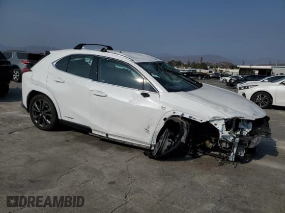 ✅ 2022 Lexus UX 250h F Sport • VIN: JTHE9JBHXN2057983 • Лот: 71456654. Опубликован ранее на Copart с пробегом 27 367 миль. Бесплатный доступ к архиву аукционных продаж из США и подробный отчёт об истории автомобиля на DreamBid. Изображение 4.