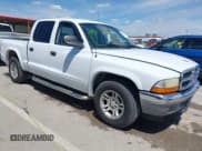 ✅ 2003 Dodge Dakota SLT • VIN: 1D7HL48X73S126440 • Lot: 42330513. Wystawiony na IAAI z przebiegiem 223 959 mil. Bezpłatny archiwum sprzedaży aukcyjnych z USA i szczegółowy raport historii pojazdu na DreamBid. Zdjęcie 1.