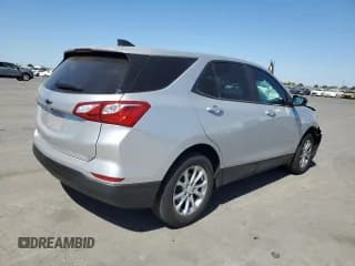 ✅ 2020 Chevrolet Equinox LS • VIN: 2GNAXHEV4L6169489 • Лот: 80621715. Опубликован ранее на Copart с пробегом 87 259 миль. Бесплатный доступ к архиву аукционных продаж из США и подробный отчёт об истории автомобиля на DreamBid. Изображение 3.