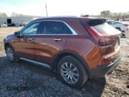 ✅ 2019 Cadillac XT4 FWD Premium Luxury • VIN: 1GYFZCR46KF116742 • Лот: 82551585. Опубликован ранее на Copart с пробегом 32 619 миль. Бесплатный доступ к архиву аукционных продаж из США и подробный отчёт об истории автомобиля на DreamBid. Изображение 2.