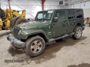 ✅ 2008 Jeep Wrangler Unlimited Sahara • VIN: 1J8GA59108L608334 • Lot: 94123835. Listed on Copart with 94,011 mi. Free auction sales archive from the USA and detailed vehicle history report at DreamBid. Image 1.