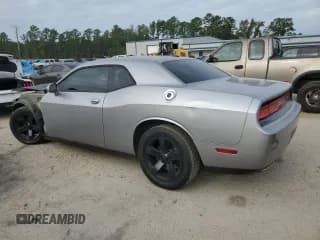 ✅ 2014 Dodge Challenger SXT • VIN: 2C3CDYAG5EH100422 • Lot: 74054424. Wystawiony na Copart z przebiegiem 154 259 mil. Bezpłatny archiwum sprzedaży aukcyjnych z USA i szczegółowy raport historii pojazdu na DreamBid. Zdjęcie 2.