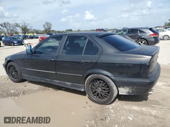 ✅ 1992 BMW 3 Series • VIN: WBACB4315NFF88940 • Lot: 69534534. Listed on Copart with 231,349 mi. Free auction sales archive from the USA and detailed vehicle history report at DreamBid. Image 2.