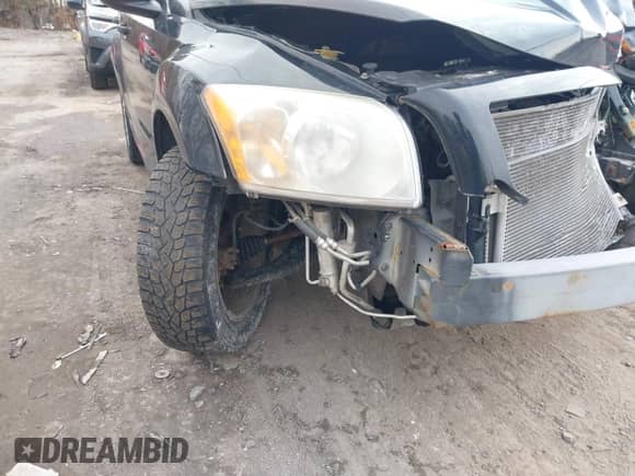 2012 Dodge Caliber SE z VIN 1C3CDWBA3CD506353, wystawiony jako IAAI lot #41656018 z przebiegiem Nie podano mil oraz . Historia ofert i sprzedaży dostępna na DreamBid. Obrazek 13.