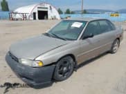 ✅ 1999 Subaru Legacy L • VIN: 4S3BD435XX6263146 • Lot: 42990804. Listed on IAAI with 329,804 mi. Free auction sales archive from the USA and detailed vehicle history report at DreamBid. Image 2.