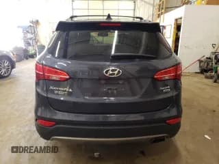 ✅ 2015 Hyundai Santa Fe • VIN: 5XYZUDLB7FG288568 • Лот: 56102424. Опубликован ранее на Copart с пробегом 91 677 миль. Бесплатный доступ к архиву аукционных продаж из США и подробный отчёт об истории автомобиля на DreamBid. Изображение 6.