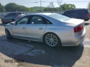 ✅ 2011 Audi A8 • VIN: WAUAVAFD7BN026927 • Lot: 54742415. Listed on Copart with 120,357 mi. Free auction sales archive from the USA and detailed vehicle history report at DreamBid. Image 2.