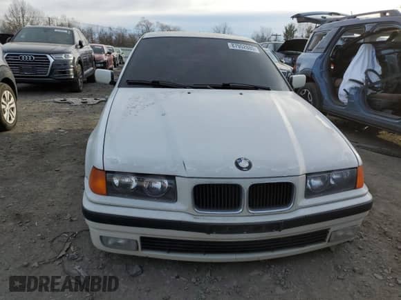 1996 BMW 3 Series z VIN 4USCD7322TLC50315, wystawiony jako Copart lot #87952885 z przebiegiem 318 396 mil mil oraz Szkoda całkowita • Salvage title. Historia ofert i sprzedaży dostępna na DreamBid. Obrazek 5.