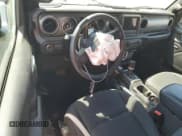 ✅ 2022 Jeep Wrangler Sport S • VIN: 1C4GJXAN7NW216074 • Lot: 64981795. Wystawiony na Copart z przebiegiem 29 394 mil. Bezpłatny archiwum sprzedaży aukcyjnych z USA i szczegółowy raport historii pojazdu na DreamBid. Zdjęcie 8.