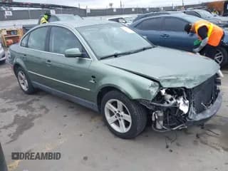 ✅ 2004 Volkswagen Passat GLX • VIN: WVWTH63B04P009753 • Lot: 41769881. Listed on IAAI with 58,628 mi. Free auction sales archive from the USA and detailed vehicle history report at DreamBid. Image 1.