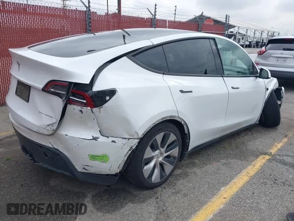 ✅ 2023 Tesla Model Y Long Range • VIN: 7SAYGAEE9PF702910 • Lot: 42199519. Wystawiony na IAAI z przebiegiem 91 094 mil. Bezpłatny archiwum sprzedaży aukcyjnych z USA i szczegółowy raport historii pojazdu na DreamBid. Zdjęcie 4.
