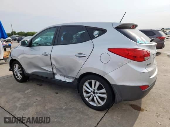 2013 Hyundai Tucson GLS with VIN KM8JU3AC7DU566198, listed as a Copart auction lot 71479605 with 196,474 mi miles and Salvage title. Bid and sale history available at DreamBid. Image 2.