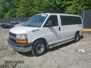 2014 Chevrolet Express Passenger LT с VIN 1GAZGYFG9E1209169, выставлен на аукционе Copart как лот 59921885 с пробегом 310 119 миль миль и Чистый • Clean title. История ставок и продаж доступна на DreamBid. Изображение 1.