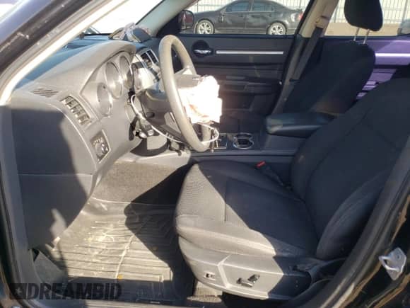 2009 Dodge Charger SXT с VIN 2B3KA33V39H507225, выставлен на аукционе Copart как лот 76617284 с пробегом 146 428 миль миль и Чистый • Clean title. История ставок и продаж доступна на DreamBid. Изображение 7.