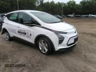 ✅ 2023 Chevrolet Bolt EV 1LT • VIN: 1G1FW6S03P4120721 • Lot: 43049889. Listed on IAAI with 31,128 mi. Free auction sales archive from the USA and detailed vehicle history report at DreamBid. Image 1.