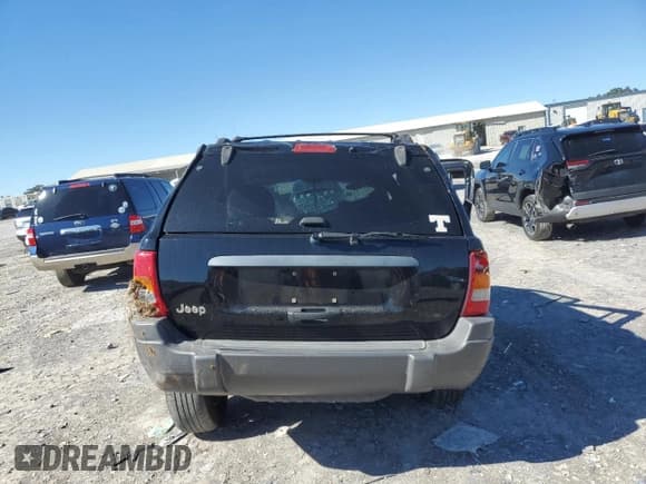 ✅ 2001 Jeep Grand Cherokee Laredo • VIN: 1J4GW48S81C677530 • Lot: 87052095. Wystawiony na Copart z przebiegiem Nie podano. Bezpłatny archiwum sprzedaży aukcyjnych z USA i szczegółowy raport historii pojazdu na DreamBid. Zdjęcie 6.