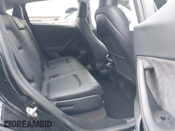 ✅ 2023 Tesla Model Y Long Range • VIN: 7SAYGAEE2PF905136 • Lot: 41572597. Listed on IAAI with 33,425 mi. Free auction sales archive from the USA and detailed vehicle history report at DreamBid. Image 8.