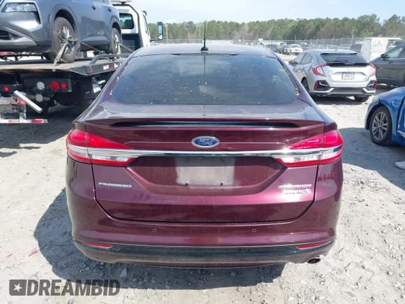 ✅ 2017 Ford Fusion Hybrid Titanium • VIN: 3FA6P0RU0HR267622 • Lot: 41834886. Listed on IAAI with 139,222 mi. Free auction sales archive from the USA and detailed vehicle history report at DreamBid. Image 16.