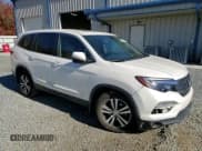 ✅ 2018 Honda Pilot EX-L • VIN: 5FNYF5H59JB002069 • Lot: 93284955. Listed on Copart with 93,923 mi. Free auction sales archive from the USA and detailed vehicle history report at DreamBid. Image 14.