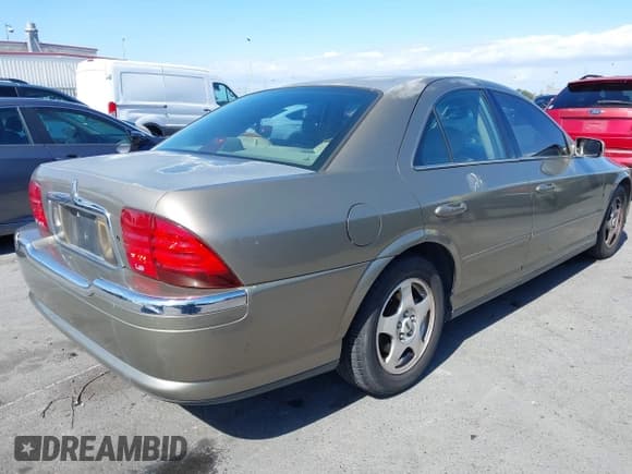 ✅ 2001 Lincoln LS Sport • VIN: 1LNHM86S31Y714332 • Лот: 42238079. Опубликован ранее на IAAI с пробегом 74 152 миль. Бесплатный доступ к архиву аукционных продаж из США и подробный отчёт об истории автомобиля на DreamBid. Изображение 4.