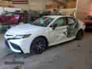 2022 Toyota Camry Hybrid SE with VIN 4T1G31AKXNU593972, listed as a Copart auction lot 84217185 with Not provided miles and Salvage title. Bid and sale history available at DreamBid. Image 1.