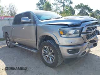✅ 2022 Ram 1500 Laramie • VIN: 1C6RREJT9NN173388 • Lot: 40480084. Listed on IAAI with 54,176 mi. Free auction sales archive from the USA and detailed vehicle history report at DreamBid. Image 1.