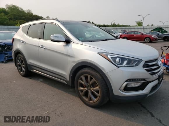 ✅ 2017 Hyundai Santa Fe Ultimate • VIN: 5XYZWDLA9HG469210 • Лот: 54872853. Опубликован ранее на Copart с пробегом 92 200 миль. Бесплатный доступ к архиву аукционных продаж из США и подробный отчёт об истории автомобиля на DreamBid. Изображение 4.