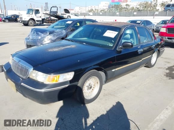 ✅ 1999 Mercury Grand Marquis LS • VIN: 2MEFM75W2XX628494 • Лот: 43619970. Опубликован ранее на IAAI с пробегом 194 181 миль. Бесплатный доступ к архиву аукционных продаж из США и подробный отчёт об истории автомобиля на DreamBid. Изображение 2.