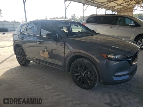 ✅ 2021 Mazda CX-5 Carbon Edition • VIN: JM3KFACM9M0348565 • Lot: 80429184. Wystawiony na Copart z przebiegiem 30 980 mil. Bezpłatny archiwum sprzedaży aukcyjnych z USA i szczegółowy raport historii pojazdu na DreamBid. Zdjęcie 4.