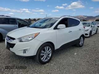 2012 Hyundai Tucson GLS z VIN KM8JU3AC0CU530111, wystawiony jako Copart lot #86188335 z przebiegiem 194 815 mil mil oraz Czysty tytuł • Clean title. Historia ofert i sprzedaży dostępna na DreamBid. Obrazek 1.