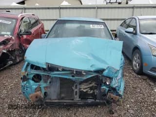 ✅ 1992 Plymouth Acclaim • VIN: 1P3XA4631NF248220 • Lot: 84113754. Wystawiony na Copart z przebiegiem 117 489 mil. Bezpłatny archiwum sprzedaży aukcyjnych z USA i szczegółowy raport historii pojazdu na DreamBid. Zdjęcie 5.