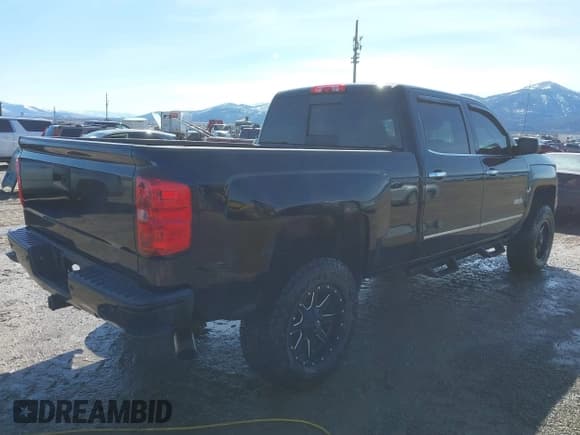 ✅ 2015 Chevrolet Silverado 1500 High Country • VIN: 3GCUKTEJ6FG272653 • Лот: 41820225. Опубликован ранее на IAAI с пробегом 130 953 миль. Бесплатный доступ к архиву аукционных продаж из США и подробный отчёт об истории автомобиля на DreamBid. Изображение 4.