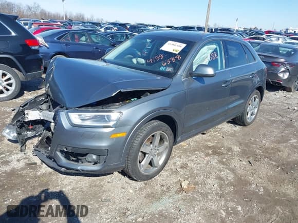 ✅ 2015 Audi Q3 Premium Plus • VIN: WA1BFCFS4FR005217 • Лот: 41586388. Опубликован ранее на IAAI с пробегом 124 511 миль. Бесплатный доступ к архиву аукционных продаж из США и подробный отчёт об истории автомобиля на DreamBid. Изображение 17.