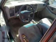 ✅ 1996 Chevrolet S-10 LS • VIN: 1GCDT19W9T8222080 • Лот: 69825904. Опубликован ранее на Copart с пробегом 166 131 миль. Бесплатный доступ к архиву аукционных продаж из США и подробный отчёт об истории автомобиля на DreamBid. Изображение 8.