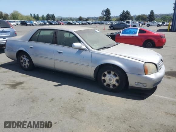 ✅ 2002 Cadillac DeVille • VIN: 1G6KD54Y92U117486 • Lot: 53924295. Listed on Copart with 170,123 mi. Free auction sales archive from the USA and detailed vehicle history report at DreamBid. Image 4.