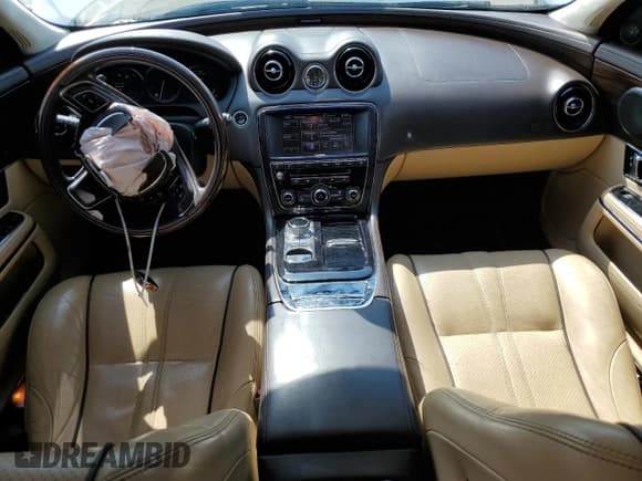 ✅ 2014 Jaguar XJ Portfolio • VIN: SAJWA2GZ0E8V61493 • Lot: 68814615. Listed on Copart with 84,526 mi. Free auction sales archive from the USA and detailed vehicle history report at DreamBid. Image 8.