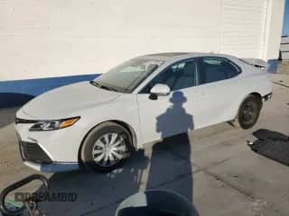 2023 Toyota Camry Hybrid LE with VIN 4T1H31AKXPU058812, listed as a Copart auction lot 85179135 with 21,816 mi miles and Salvage title. Bid and sale history available at DreamBid. Image 1.