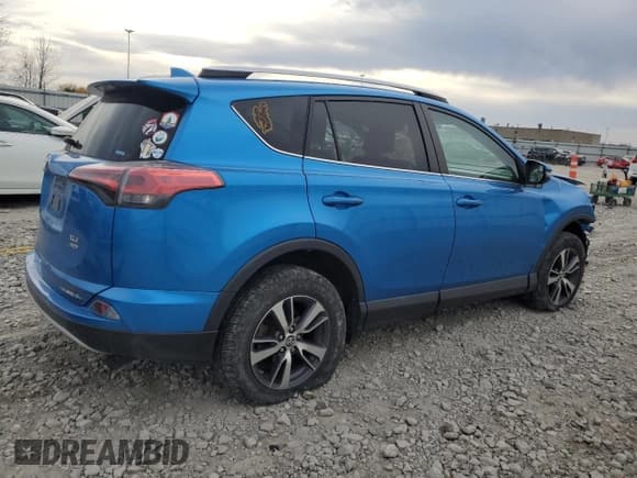 ✅ 2016 Toyota RAV4 XLE • VIN: 2T3RFREV6GW461319 • Lot: 91498965. Listed on Copart with 147,388 mi. Free auction sales archive from the USA and detailed vehicle history report at DreamBid. Image 3.