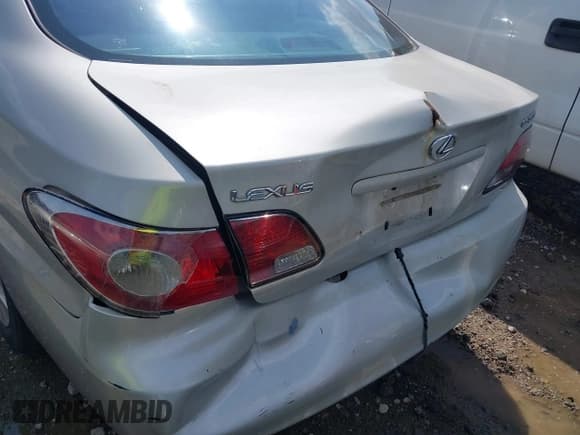 ✅ 2002 Lexus ES 300 • VIN: JTHBF30G520077387 • Lot: 42303130. Listed on IAAI with 215,342 mi. Free auction sales archive from the USA and detailed vehicle history report at DreamBid. Image 6.