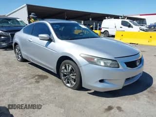 ✅ 2010 Honda Accord EX • VIN: 1HGCS1B73AA010977 • Lot: 42848710. Listed on IAAI with 206,221 mi. Free auction sales archive from the USA and detailed vehicle history report at DreamBid. Image 1.