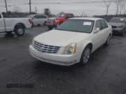 ✅ 2006 Cadillac DTS 1SC • VIN: 1G6KD57Y06U210561 • Lot: 41637188. Listed on IAAI with 177,048 mi. Free auction sales archive from the USA and detailed vehicle history report at DreamBid. Image 2.