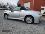 ✅ 1996 Alfa Romeo Spider • VIN: ZAR91600006013048 • Lot: 49108125. Listed on Copart with 143,888 mi. Free auction sales archive from the USA and detailed vehicle history report at DreamBid. Image 2.
