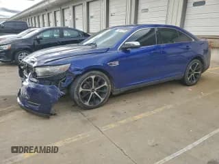 ✅ 2015 Ford Taurus Limited • VIN: 1FAHP2F87FG155089 • Лот: 94672795. Опубликован ранее на Copart с пробегом 127 824 миль. Бесплатный доступ к архиву аукционных продаж из США и подробный отчёт об истории автомобиля на DreamBid. Изображение 1.