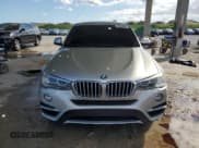 ✅ 2015 BMW X4 xDrive28i • VIN: 5UXXW3C50F0M88914 • Lot: 89833905. Listed on Copart with 87,775 mi. Free auction sales archive from the USA and detailed vehicle history report at DreamBid. Image 5.