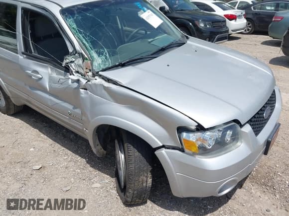 ✅ 2006 Ford Escape Hybrid • VIN: 1FMCU96H26KA58171 • Lot: 42557943. Listed on IAAI with 191,976 mi. Free auction sales archive from the USA and detailed vehicle history report at DreamBid. Image 6.