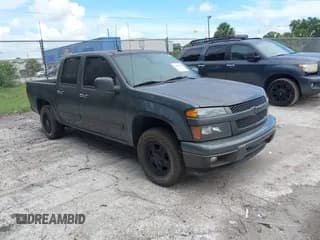 ✅ 2012 Chevrolet Colorado 1LT • VIN: 1GCDSCF97C8157453 • Lot: 42593095. Listed on IAAI with 122,733 mi. Free auction sales archive from the USA and detailed vehicle history report at DreamBid. Image 1.